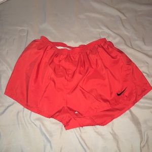 Red Nike shorts